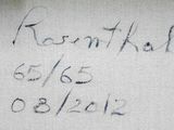 a close up of a handwriting on a piece of paper