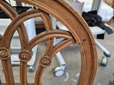 a chair that has been painted brown and is in the process of being painted