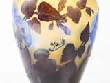 a vase that has a picture of a couple on it