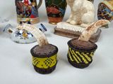 many different vases that are on a table