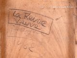 a picture of a wooden box with graffiti written on it