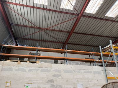 a room with a lot of scaffolding on the ceiling