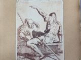 an old picture of a man holding a sword in front of another man