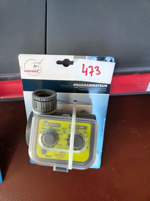 a box with a water meter and a water meter on it