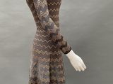 a brown and black dress on a mannequin mannequin mannequin mannequin mannequin mannequin mannequin mannequin mann