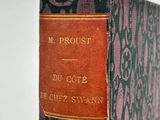 a book with a red cover sitting on a table