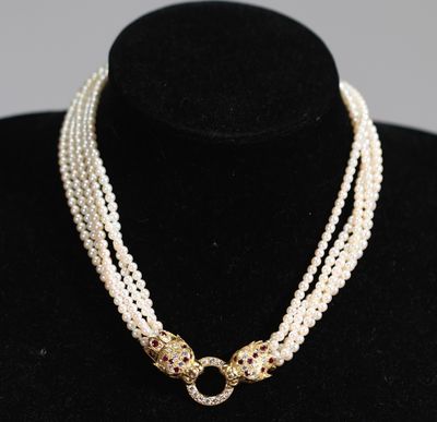 Collier à cinq rangs de perles de mer, orné d’un fermoir en … - Photo 1