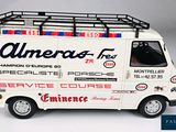 a toy van that is sitting on a white surface