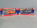 two toy vehicles that are sitting side by side on a table
