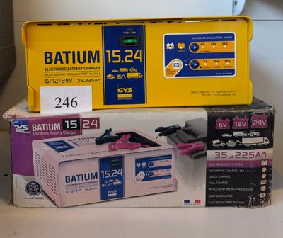 boxes of batteries and batteries are stacked on top of each other