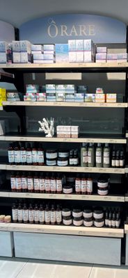 many shelves with various products on them in a store