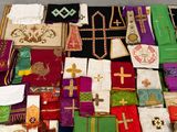 many different colored cloths laid out on the floor