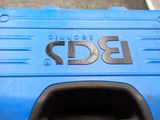 a blue suitcase that is sitting on the ground