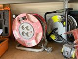 many different types of hoses and other tools on the floor