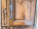 a wooden door with a metal handle on it