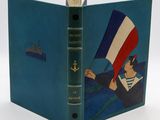un vieux livre sur lequel figure l'image d'un homme tenant un drapeau français
