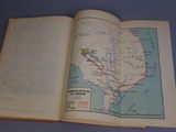an open book with a map of the united states on it
