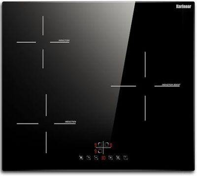 a close up of a black glass stove top with buttons on it