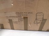 a cardboard box with a picture of a folding chair in it