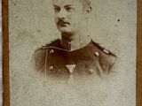 an old photo of a man in a military uniform