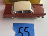 une image représentant une petite voiture rouge portant le numéro 55