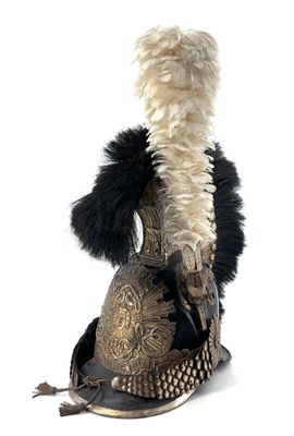 helmet with feathers on it and a feathered hat on top of it