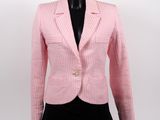 a woman ' s pink and white striped blazer on a mannequin mannequin mannequin mannequin mannequin mannequin manne