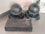 two speakers that are on top of a box
