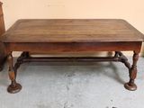 a wooden table that is sitting in a room