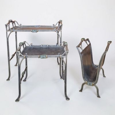two chairs and a table with a chair on it