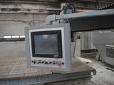 a picture of a machine that is working on a piece of wood