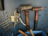 many tools that are sitting in a blue container