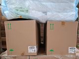 many boxes stacked on top of each other on a pallet