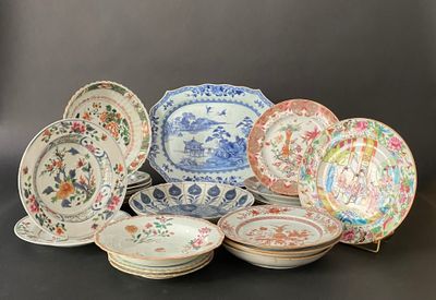 a lot of plates that are sitting on a table