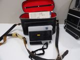 a camera and a camera case sitting on a table