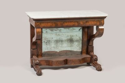 a small table with a mirror on top of it