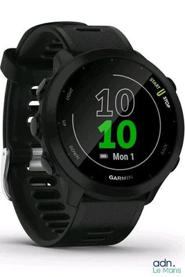 a close up of a smart watch on a white surface