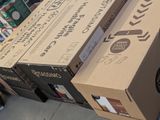 several boxes of beer are stacked on top of each other in a store