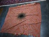 a rug on the floor next to a rug on the floor