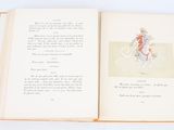 an open book with a picture of a man on a horse