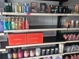 many different types of cosmetics on the shelves in the store