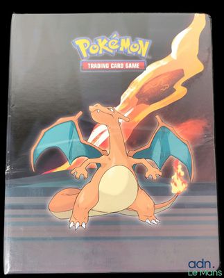 the pokemon trading card game is on display on the table