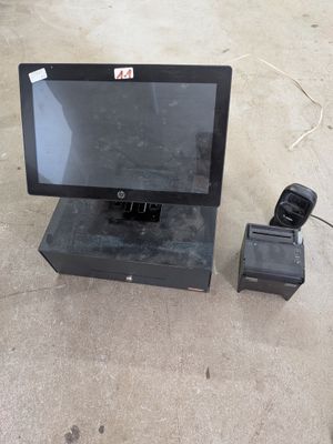 a small monitor and a camera on the ground