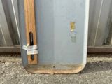 a metal door with a handle and a handle on it