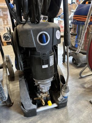 a machine that is sitting on the floor in the garage