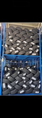 two crates of tires that are stacked on top of each other
