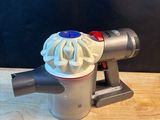 a small blow dryer sitting on a wooden table