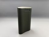 an image of a black lighter sitting on top of a white table