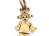 a close up of a small gold robot charm on a white background