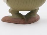 a small toy that is sitting on a table